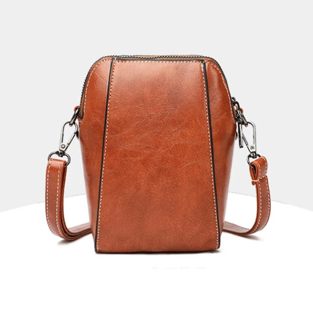 Retro Crossbody Läderväska för Kvinnor - Justerbar Axelrem, Lättförvarad och Stilren